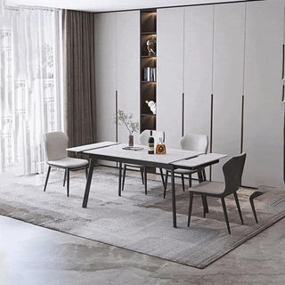 Extendable dining table with chairs